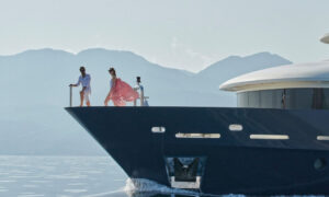 young couple on the deck of the luxury motor yacht serenity