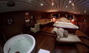 Master cabin with bed and jacuzzi on Gulet Bedia Sultan - Ultimate relaxation with Bodrum Gulet Exclusive Escapes