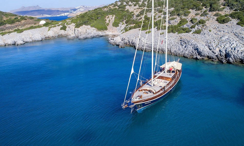 Gulet Zephyria 2 anchored in a serene Bodrum bay, ideal for family gulet vacations